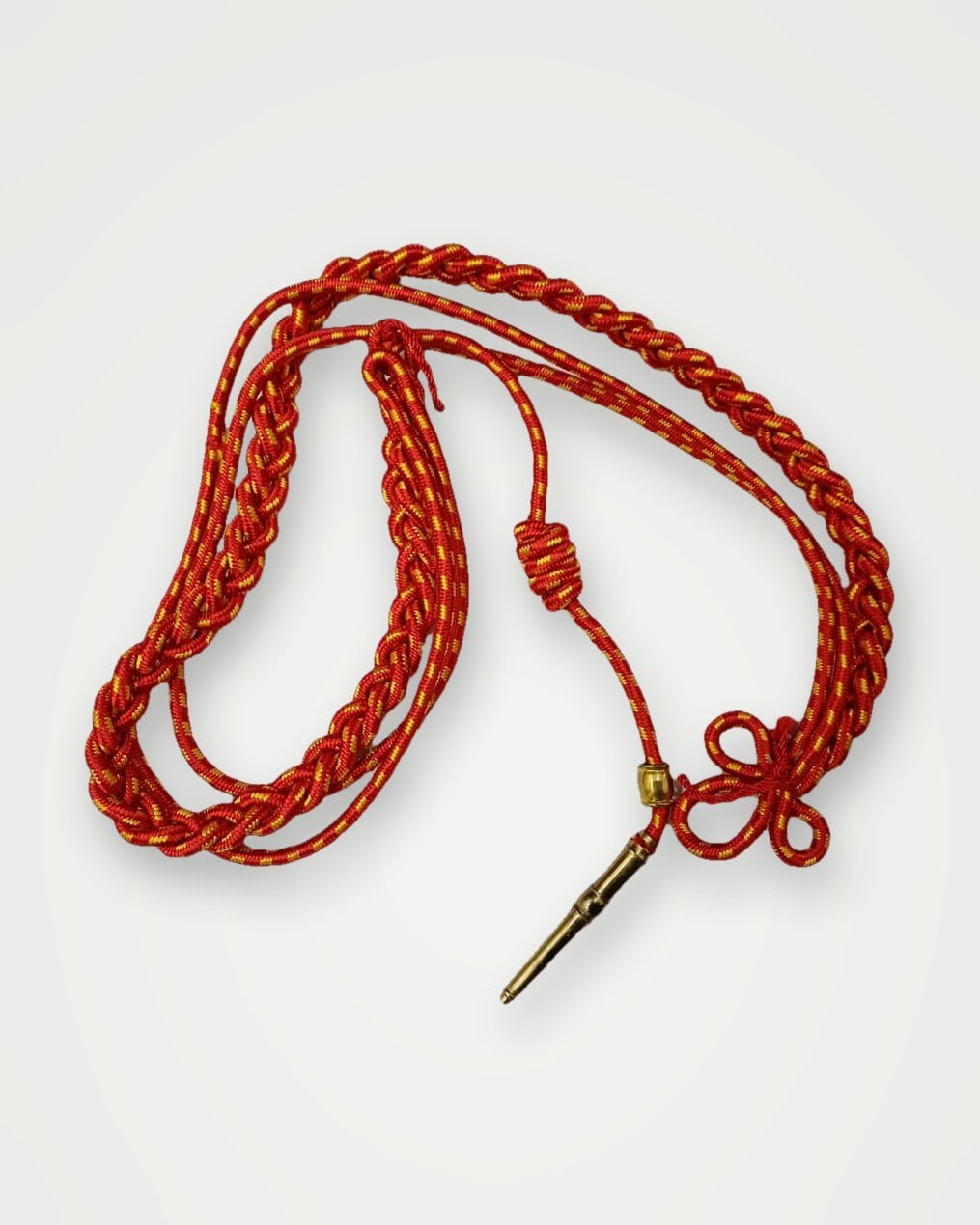 Orange braided aiguillette cord with metal tip