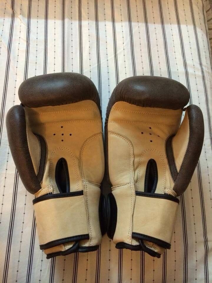 Vintage-style brown leather boxing gloves