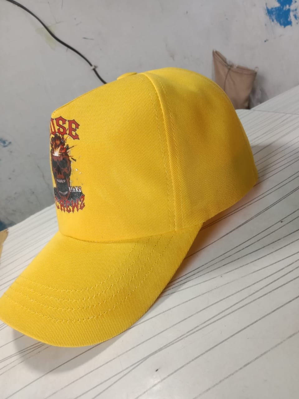 Yellow cap with an embroidered front