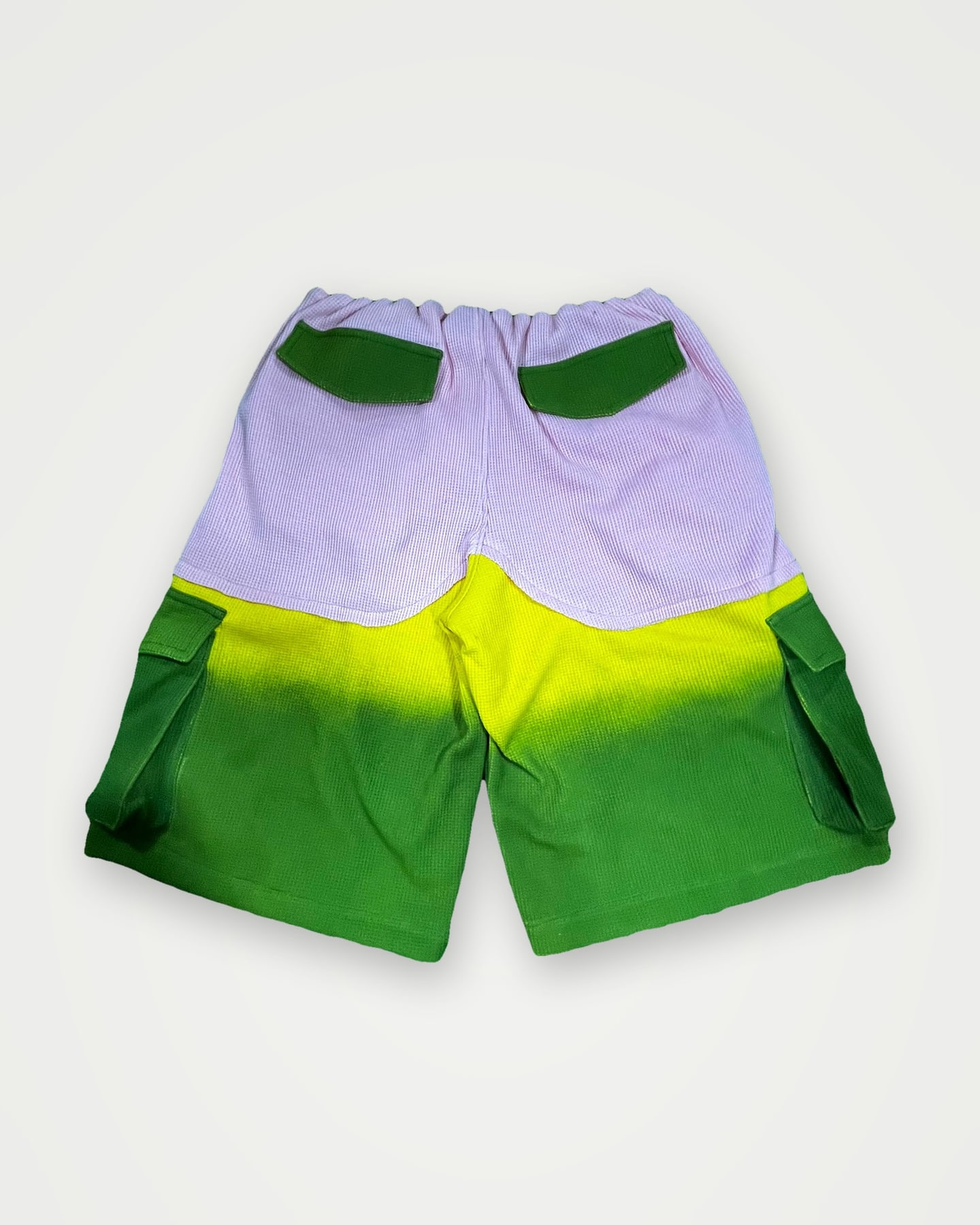 Back of lilac to green ombré cargo shorts