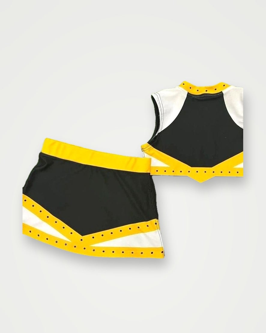 Cheerleading uniform skirt and top in black, gold and white
