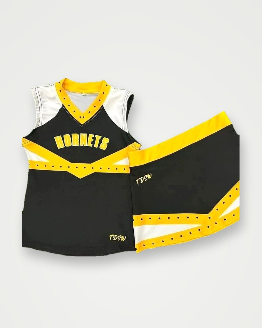 Black and gold cheerleading top and skirt with star trim