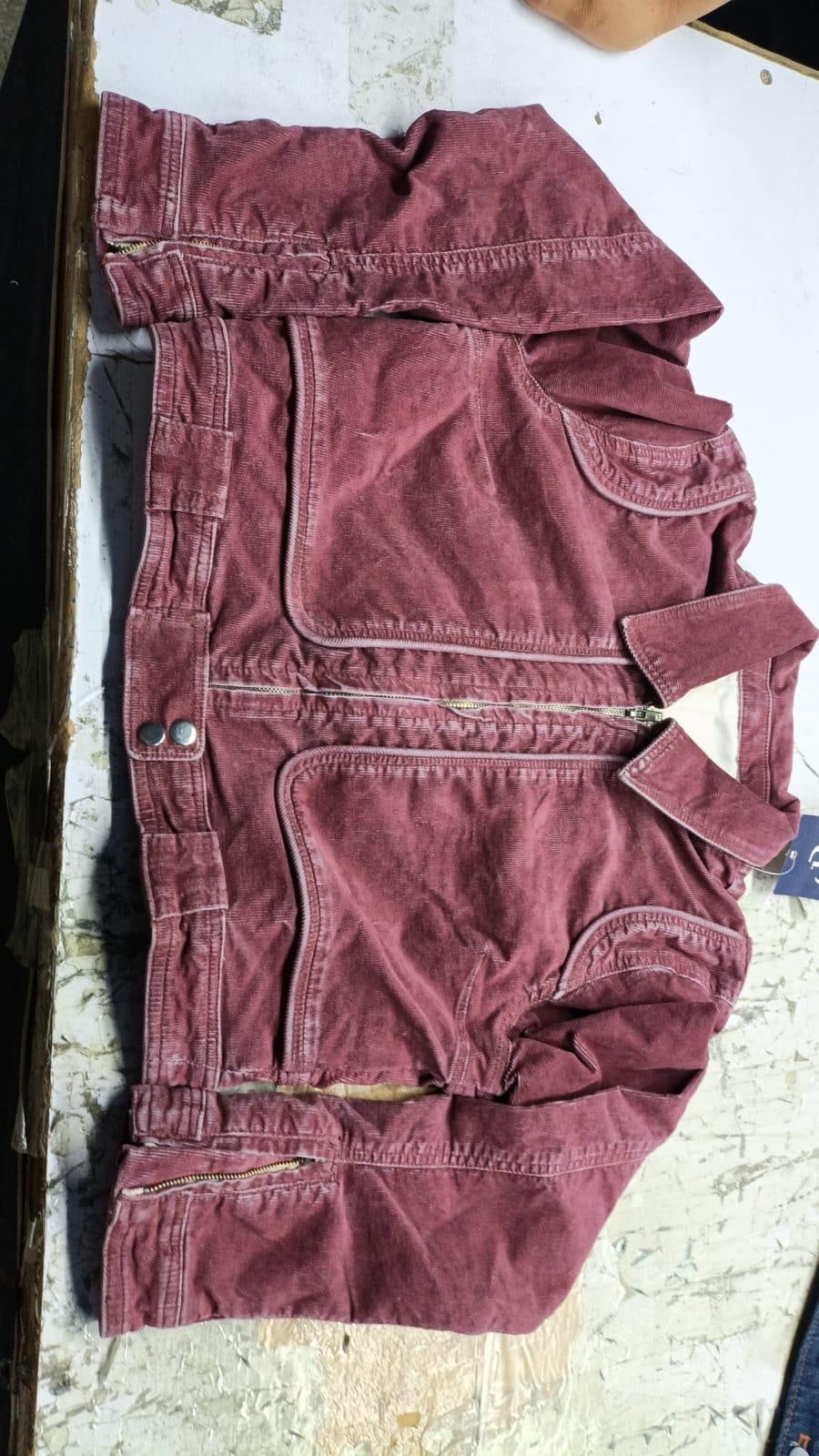 Back of a burgundy corduroy jacket with contrast stitching