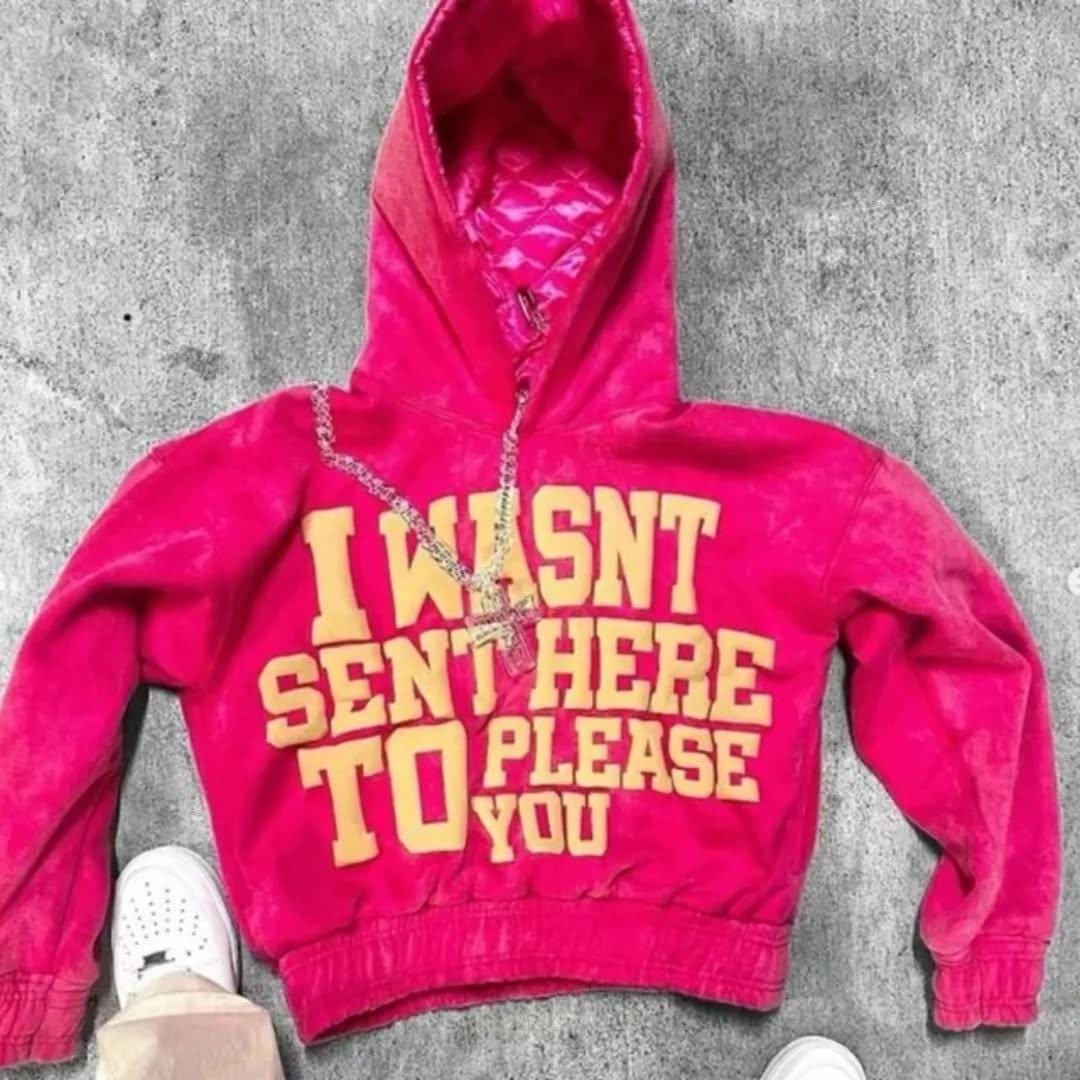 Pink acid-wash hoodie with yellow puff-print slogan