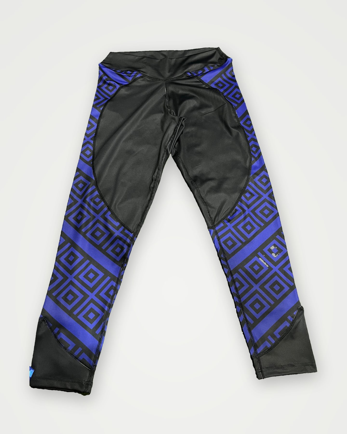 Black leggings with blue sublimated pattern panels
