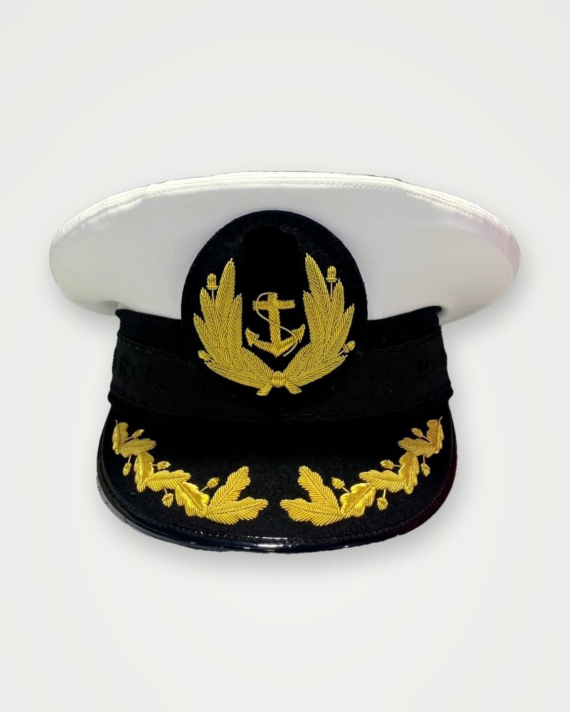 White-top naval peak cap with gold embroidered badge and visor