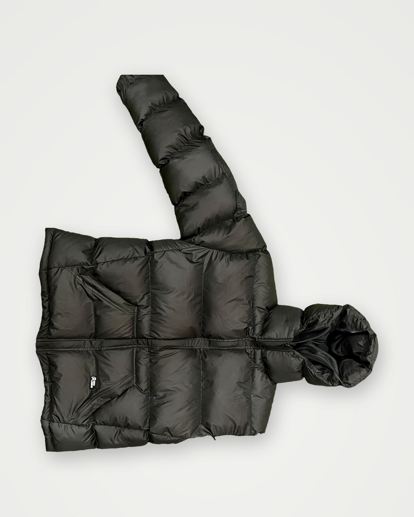 Black quilted hooded puffer jacket, front