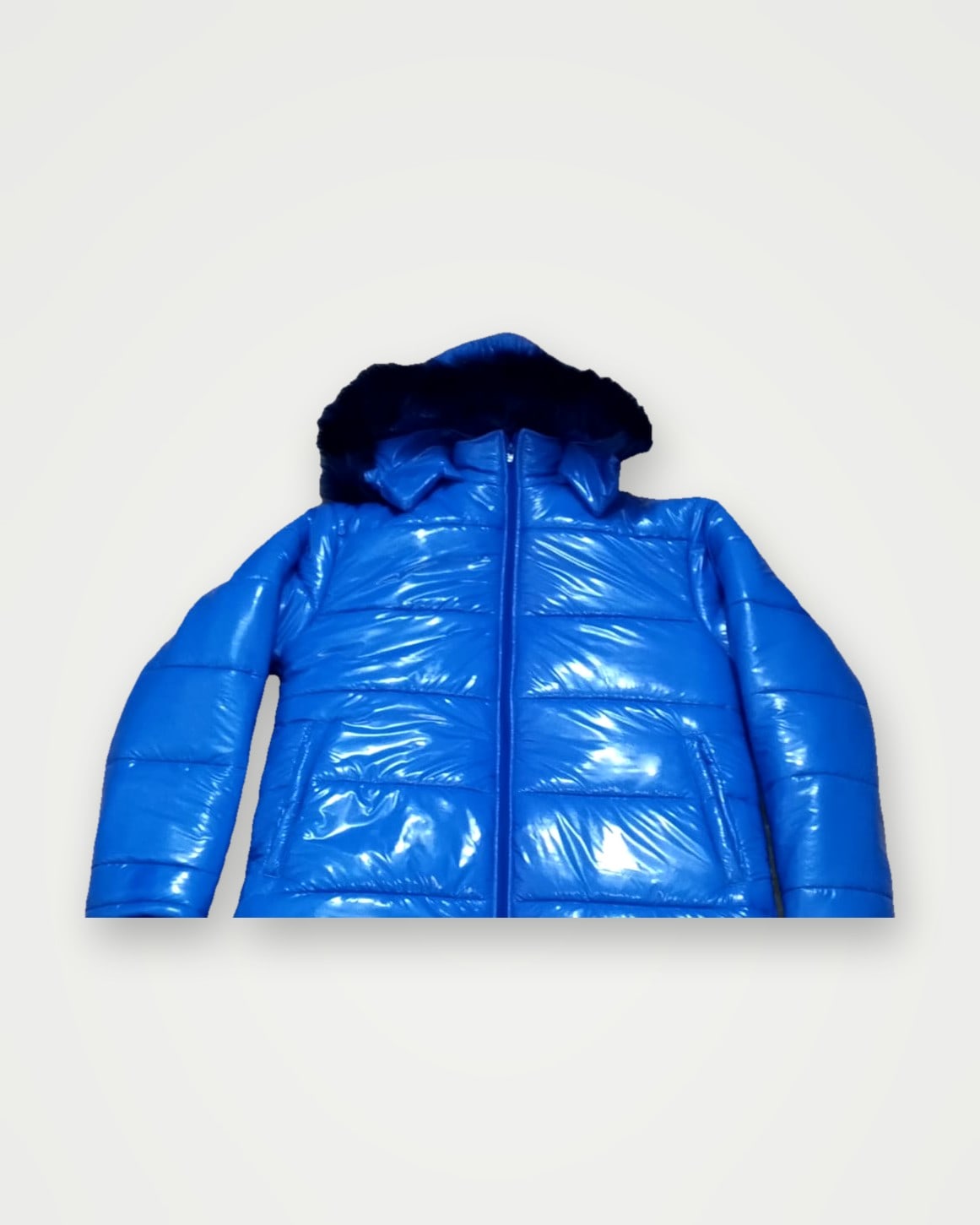 Glossy blue puffer jacket with a fur-trimmed hood