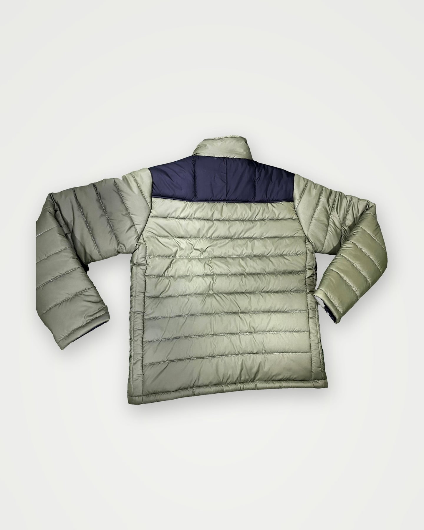 Grey quilted puffer jacket with a navy yoke