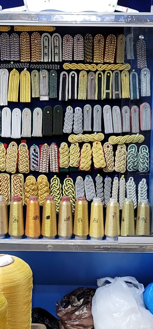 Display wall of shoulder boards, epaulettes and bullion thread