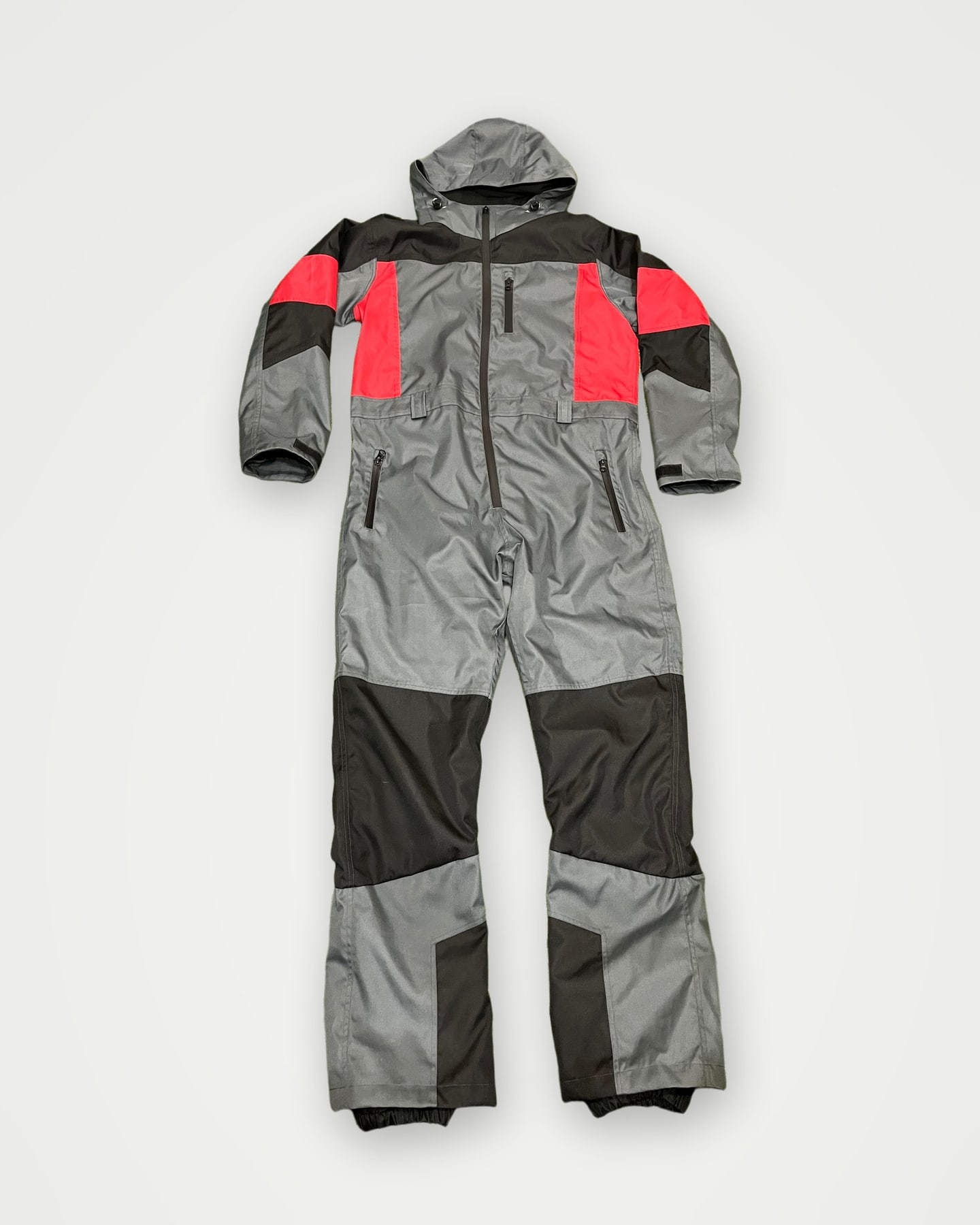 Grey, black and red one-piece hooded ski suit