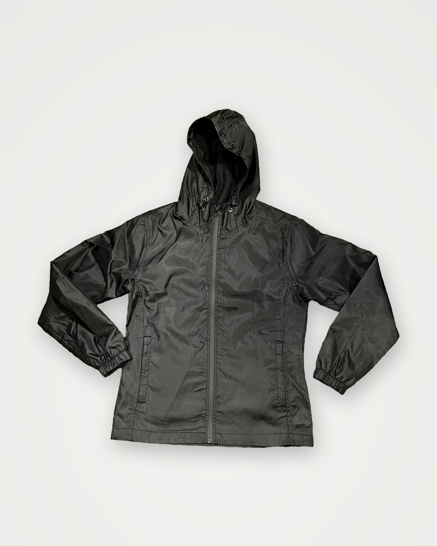 Black hooded softshell jacket with zip pockets