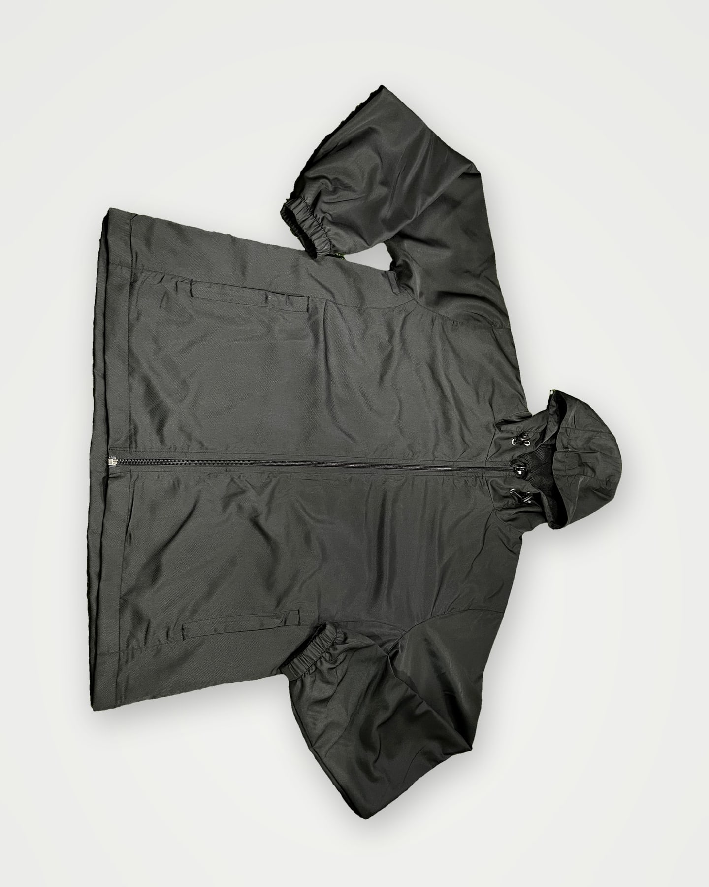 Black hooded softshell jacket shown from the back