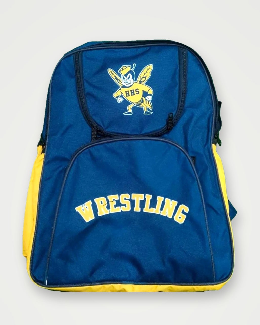 Blue and yellow team backpack with an embroidered mascot and lettering