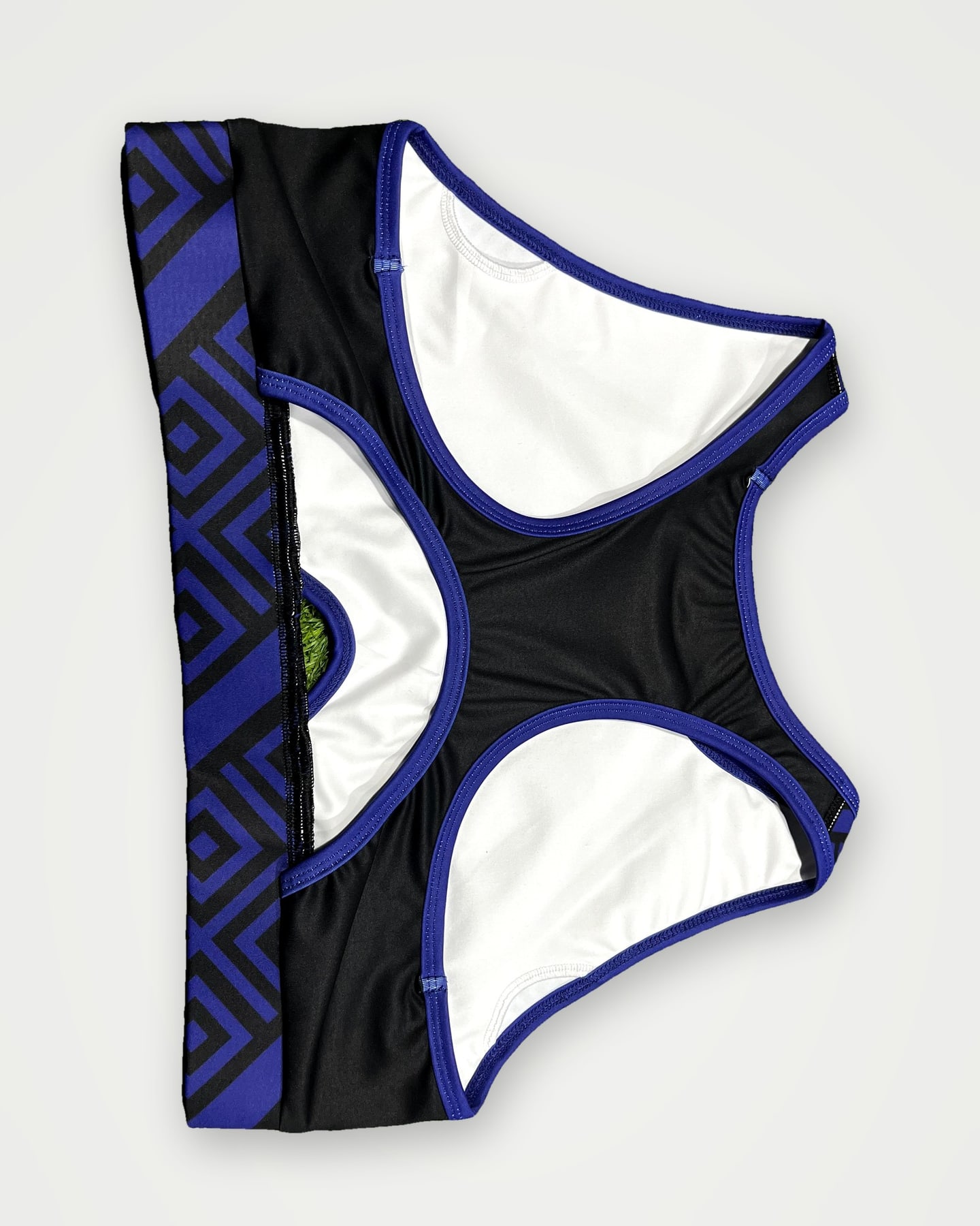 Navy geometric-trim sports bra, back view