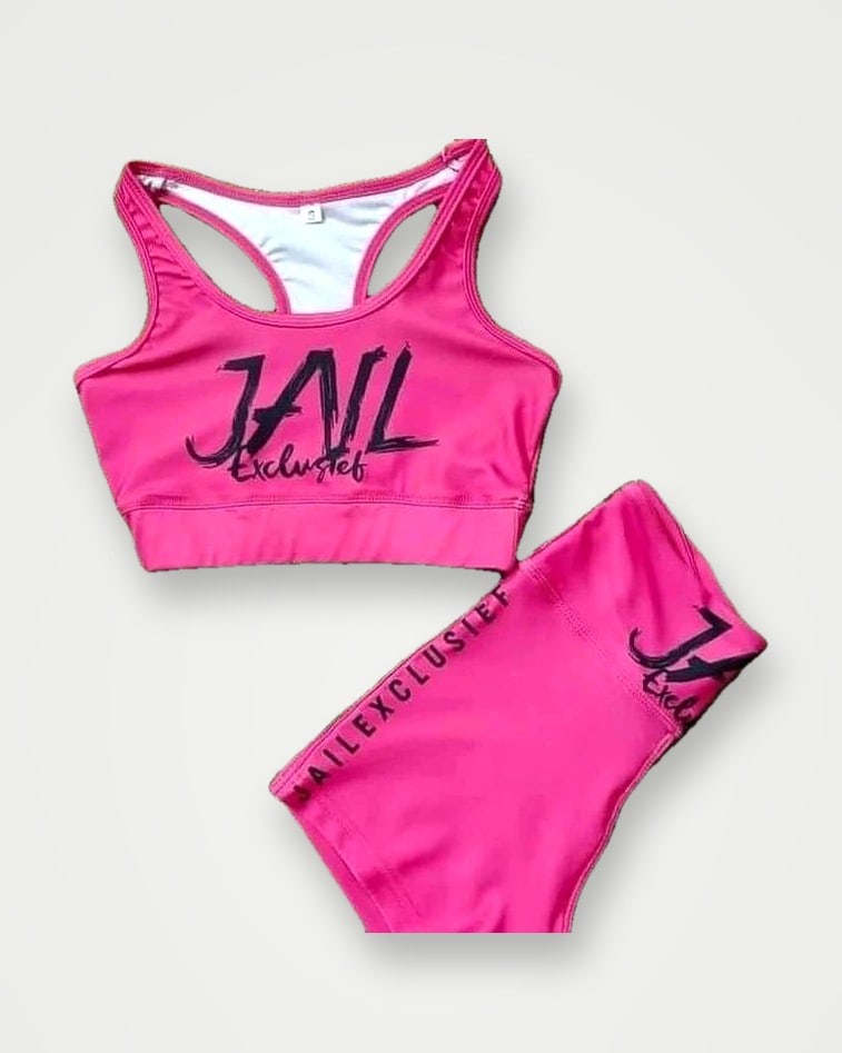 Pink sports bra and shorts set with printed lettering