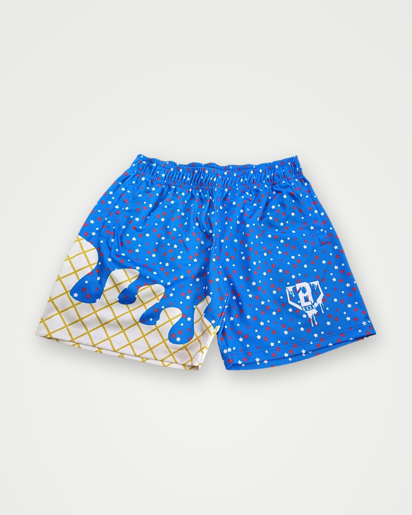 Blue and cream sublimated shorts with a drip pattern