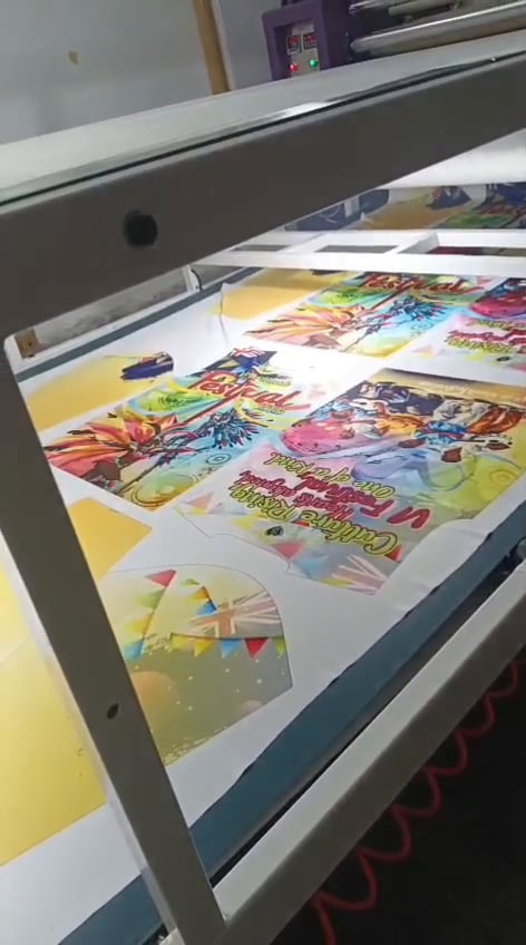 Sublimation-printed fabric laid on the transfer table