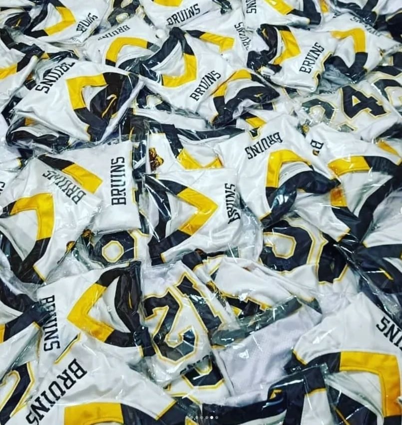 A batch of finished team jerseys bagged for dispatch