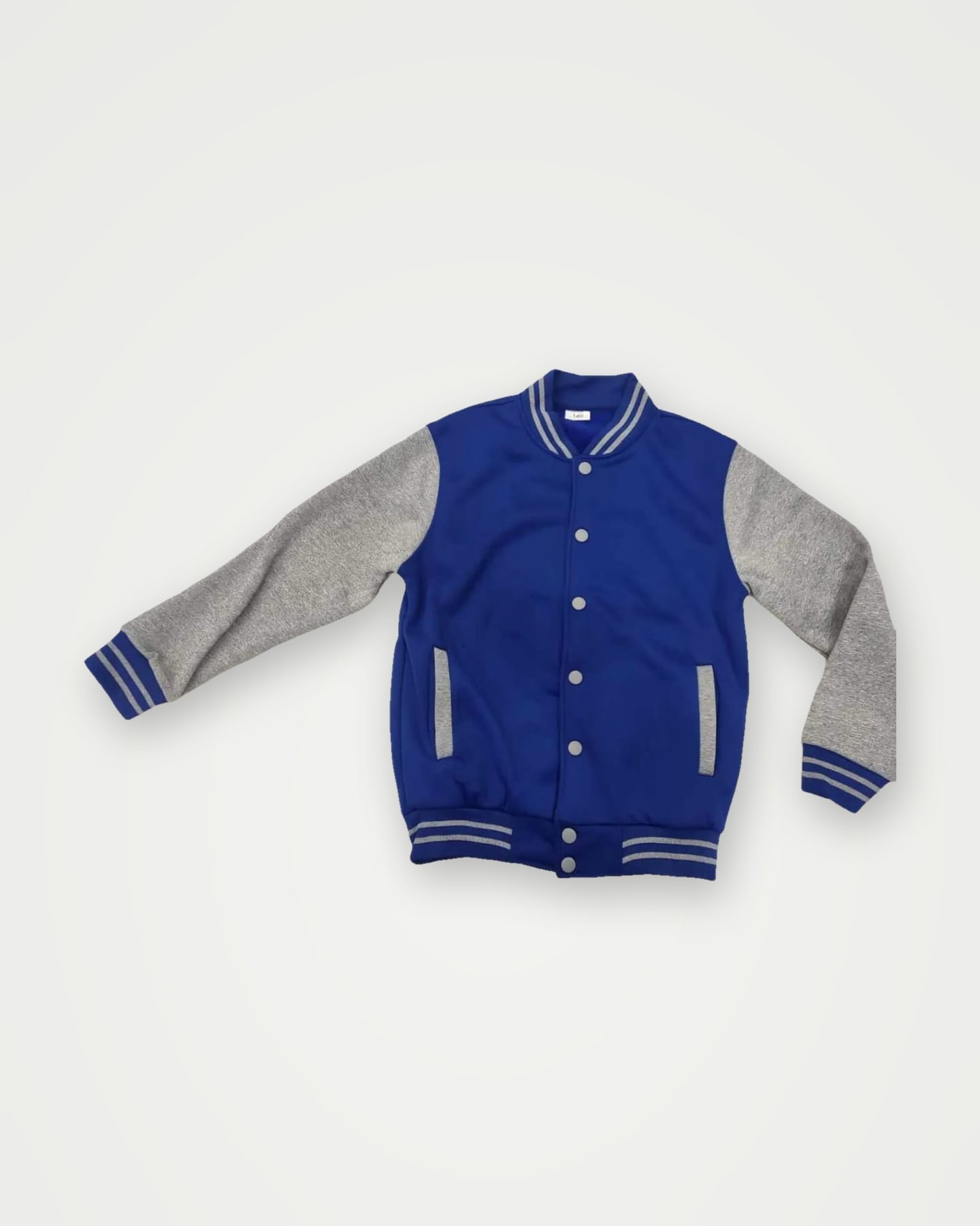 Royal blue varsity jacket with grey sleeves and striped rib trims